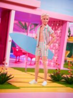 Mattel - Barbie The Movie Doll Ken Wearing Pastel Striped Beach Matching Set