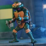 NECA - Teenage Mutant Ninja Turtles (Cartoon) Action Figure Ultimate Michelangelo VHS 18 cm
